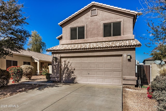 front of property with a garage