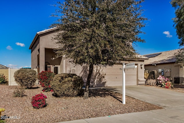 view of front of house with a garage