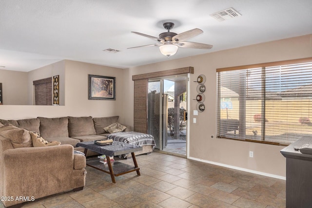 living room with ceiling fan