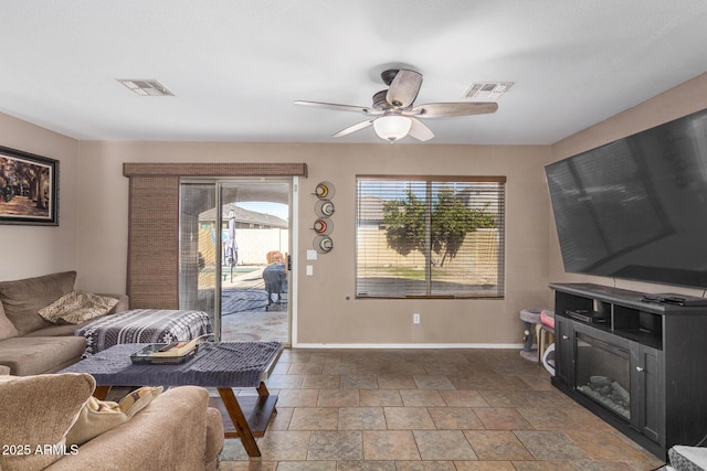 living room with ceiling fan