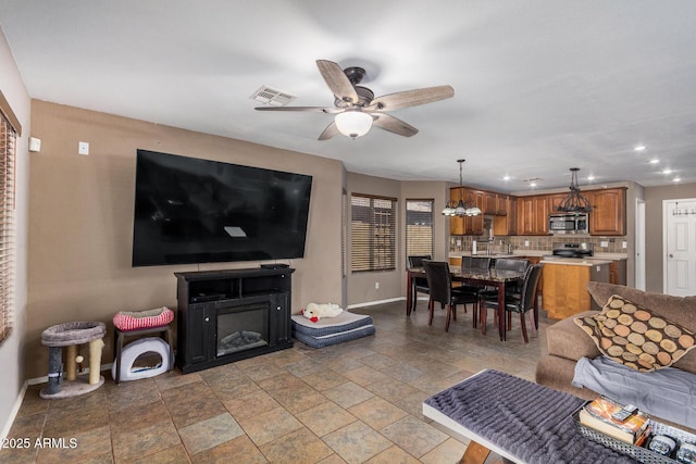 living room featuring ceiling fan