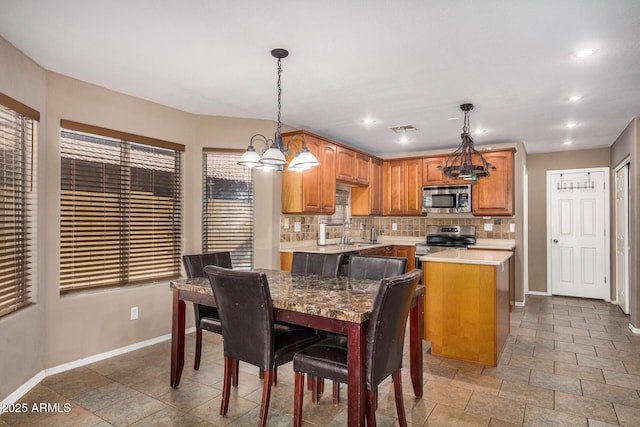 dining area featuring sink