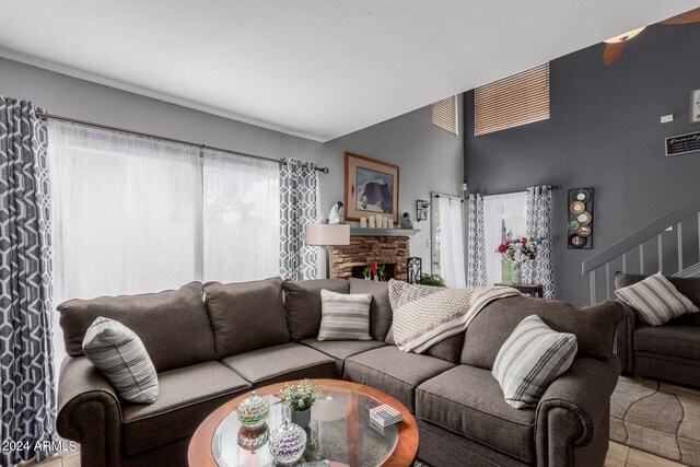 tiled dining area featuring ceiling fan