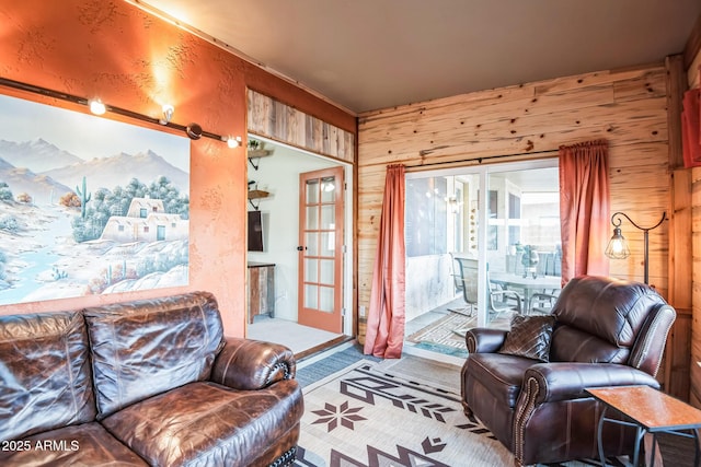 living room featuring wood walls