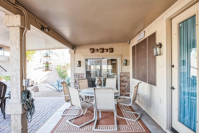 view of patio featuring a porch