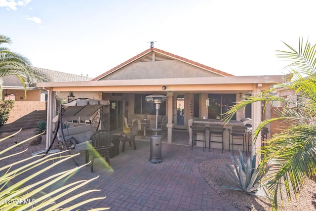 view of patio featuring a bar