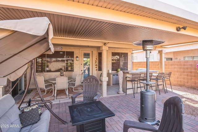 view of patio / terrace featuring a bar