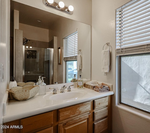 bathroom with vanity and an enclosed shower