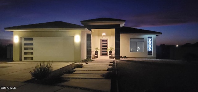 prairie-style home with a garage