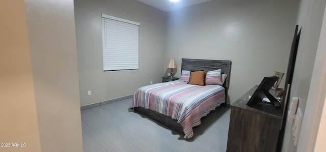 bedroom featuring dark hardwood / wood-style floors