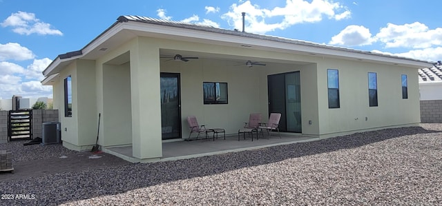 back of property with a patio, ceiling fan, and central air condition unit