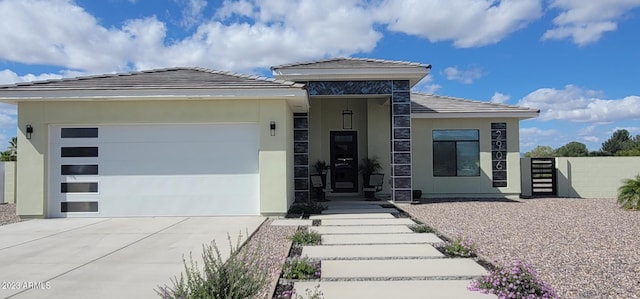 view of front of home with a garage