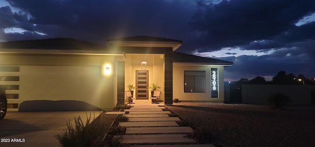 view of front of home with a garage