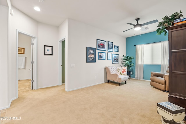 3022 E Santa Fe Ln, Gilbert, AZ 85297 - living area with light carpet, a ceiling fan, and recessed lighting