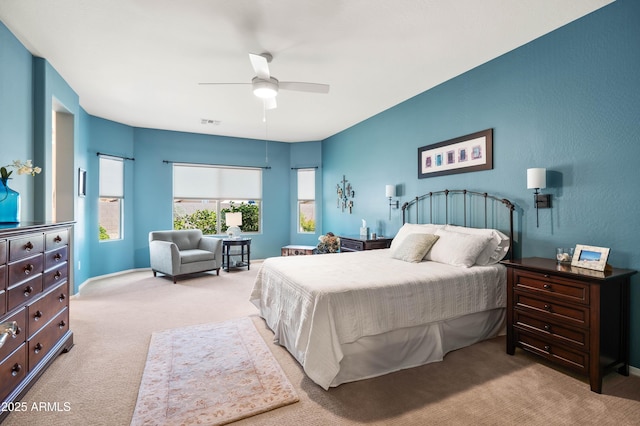3022 E Santa Fe Ln, Gilbert, AZ 85297 - carpeted bedroom with a ceiling fan