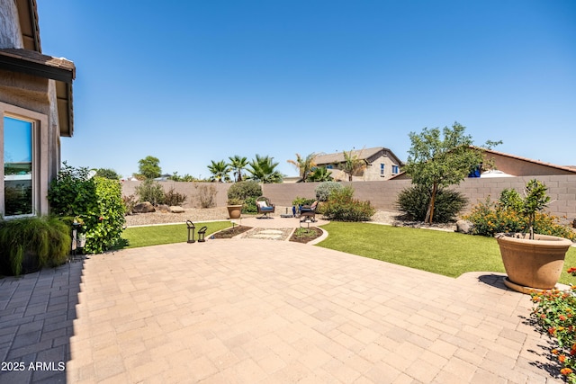 3022 E Santa Fe Ln, Gilbert, AZ 85297 - fenced backyard with a patio