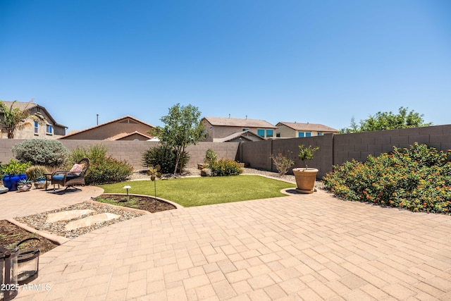 3022 E Santa Fe Ln, Gilbert, AZ 85297 - fenced backyard featuring a patio