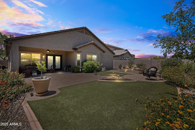 3022 E Santa Fe Ln, Gilbert, AZ 85297 - rear view of property featuring a fenced backyard, a patio, french doors, and stucco siding
