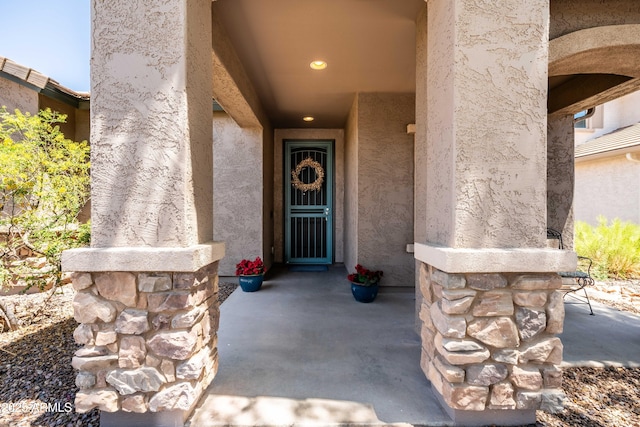 3022 E Santa Fe Ln, Gilbert, AZ 85297 - doorway to property featuring stucco siding