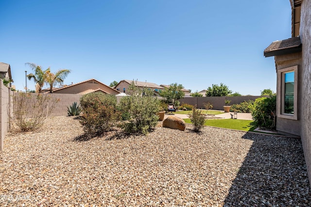 3022 E Santa Fe Ln, Gilbert, AZ 85297 - fenced backyard with a patio