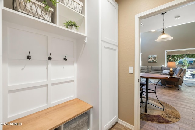 mudroom featuring light wood-style floors