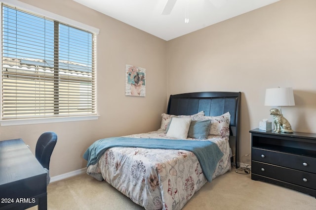 bedroom featuring carpet, baseboards, and ceiling fan