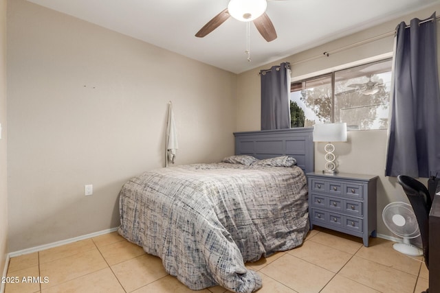 bedroom with light tile patterned floors and ceiling fan