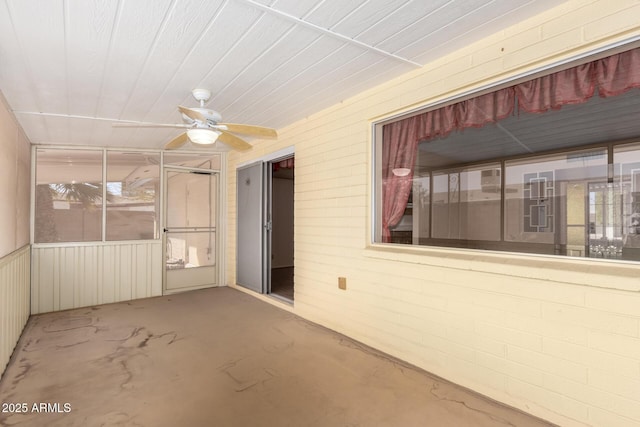 interior space featuring a ceiling fan