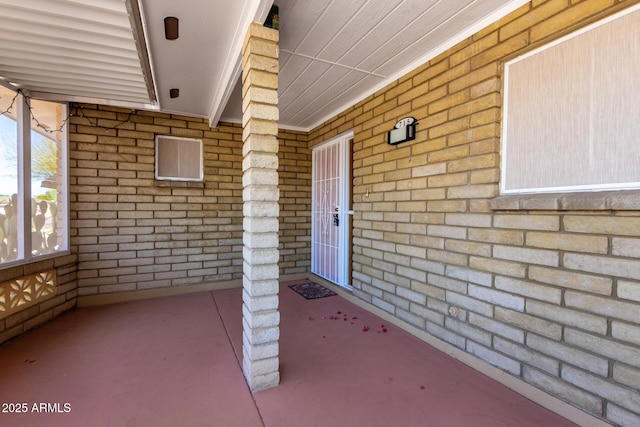 property entrance featuring covered porch