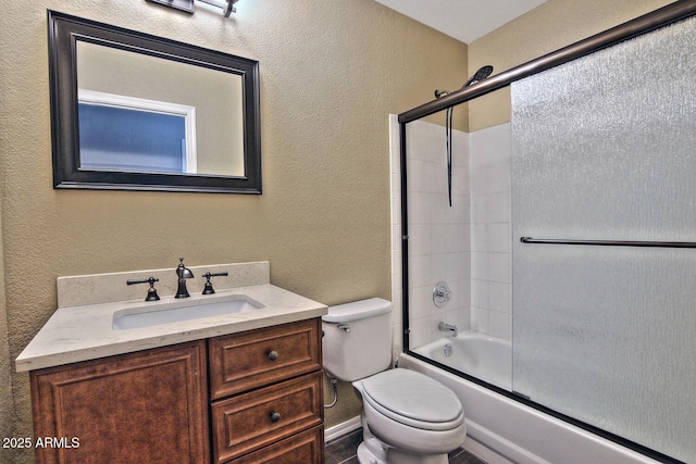 1741 S Clearview Ave Unit 13, Mesa, AZ 85209 - bathroom featuring a textured wall, vanity, and shower / bath combination with glass door