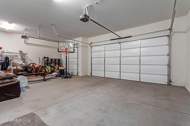 garage featuring a garage door opener