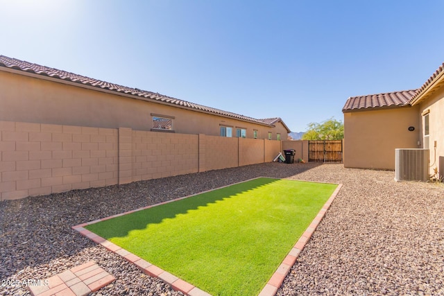 view of yard featuring central AC