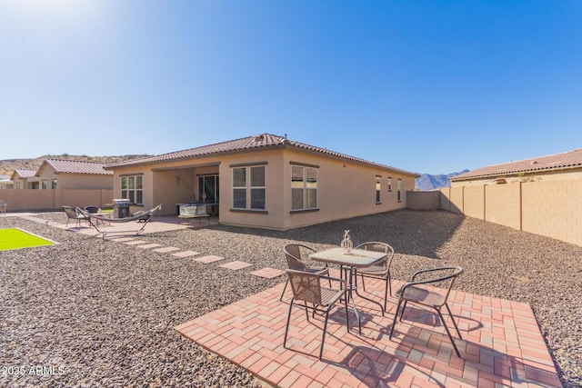 rear view of property with a patio area