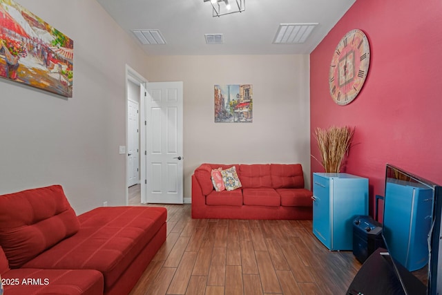 living room featuring dark hardwood / wood-style flooring