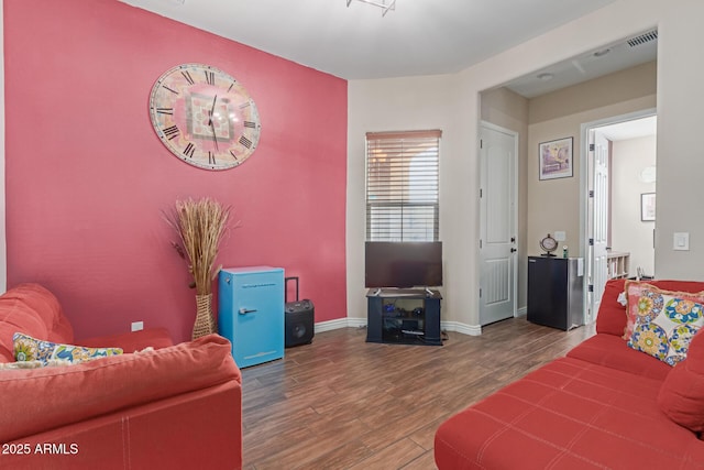 living room with hardwood / wood-style floors