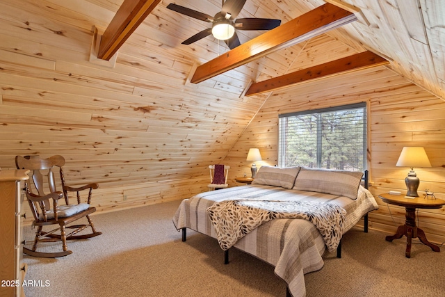 carpeted bedroom with wood ceiling, vaulted ceiling with beams, and wooden walls