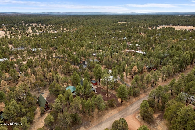 bird's eye view with a view of trees