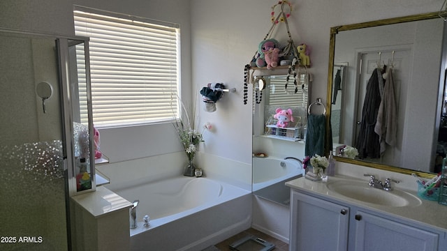 10036 W Chipman Rd, Tolleson, AZ 85353 - bathroom featuring a bath, vanity, and a stall shower