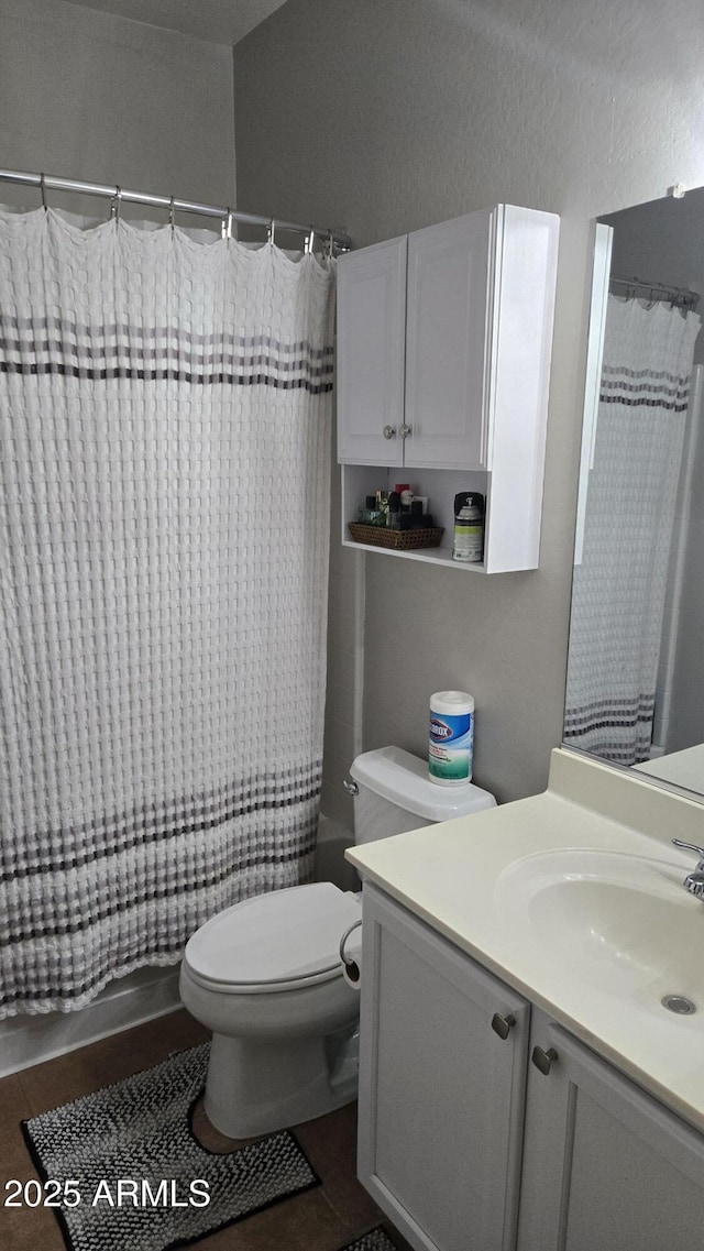 10036 W Chipman Rd, Tolleson, AZ 85353 - full bathroom featuring vanity, a shower with curtain, and tile patterned flooring