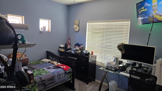 10036 W Chipman Rd, Tolleson, AZ 85353 - carpeted bedroom featuring a desk and multiple windows