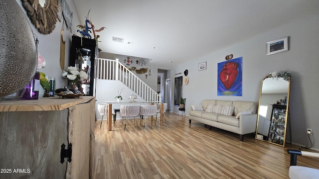 10036 W Chipman Rd, Tolleson, AZ 85353 - living area featuring stairs and light wood-style floors