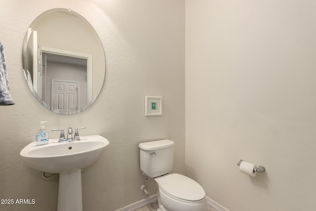 bathroom featuring toilet