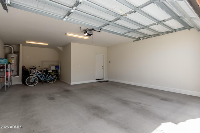 garage featuring gas water heater and a garage door opener