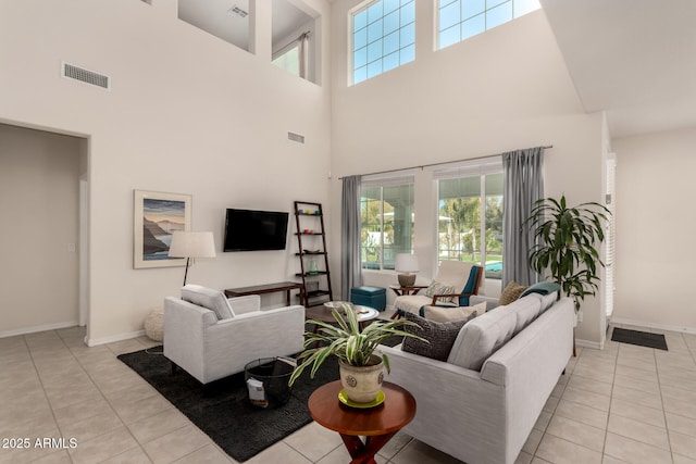 living room with light tile patterned floors