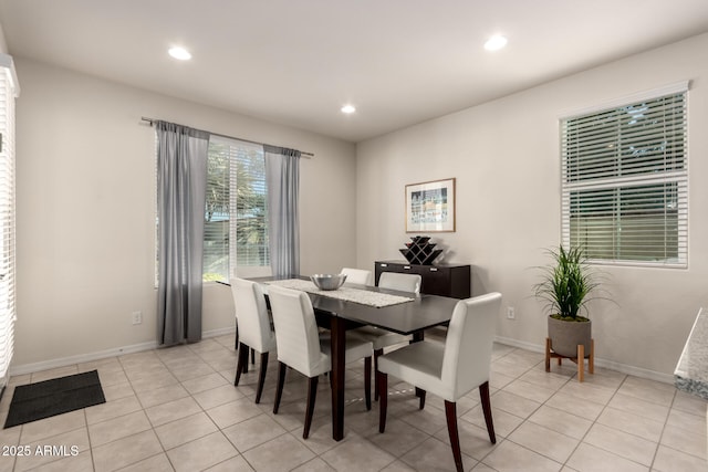 dining room featuring light tile patterned floors