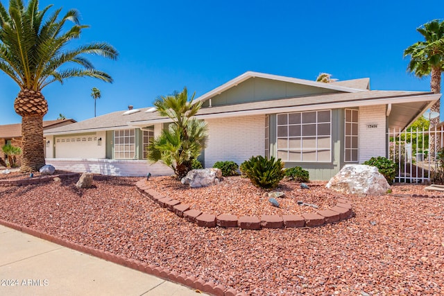 ranch-style house with a garage