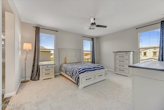 6503 E Bluefield Ave, Phoenix, AZ 85054 - bedroom featuring light carpet, baseboards, and ceiling fan