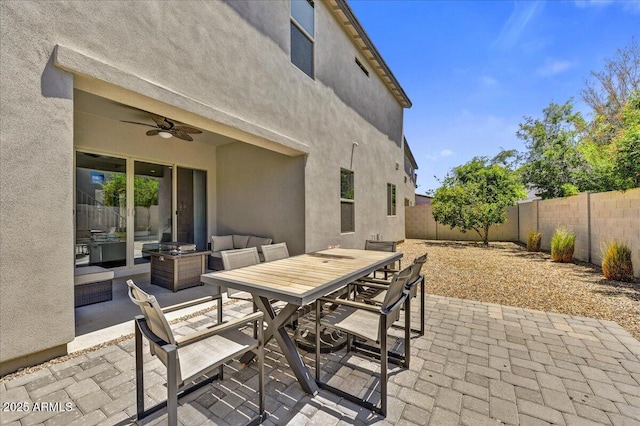 6503 E Bluefield Ave, Phoenix, AZ 85054 - view of patio / terrace with outdoor dining area, a fenced backyard, and a ceiling fan