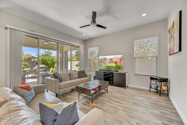 6503 E Bluefield Ave, Phoenix, AZ 85054 - living area featuring a ceiling fan, light wood-style flooring, baseboards, and recessed lighting