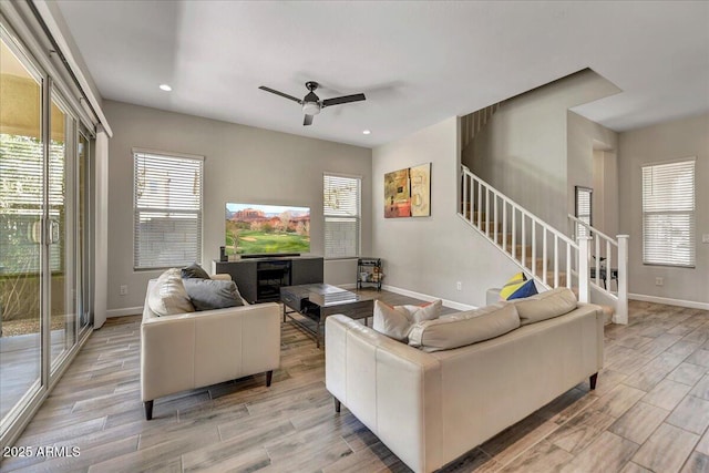 6503 E Bluefield Ave, Phoenix, AZ 85054 - living room featuring stairway, plenty of natural light, light wood finished floors, and recessed lighting